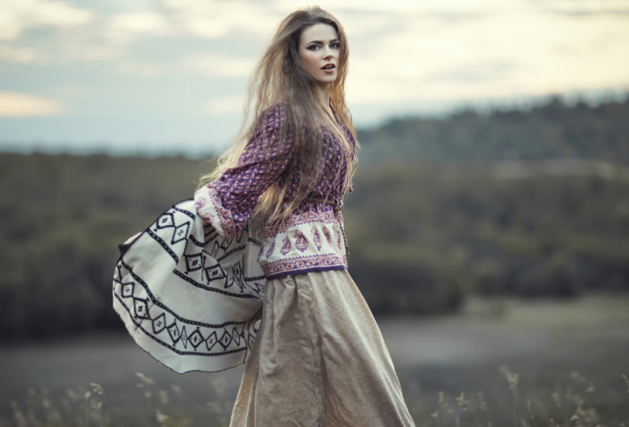 Beautiful hippie girl jumping