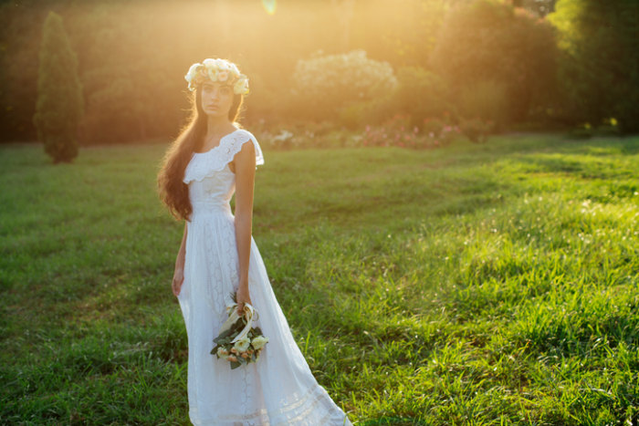 Beautiful bride on a background of summer forest