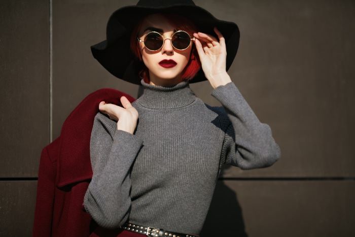 Closeup portrait of young beautiful fashionable woman with sunglasses. Lady