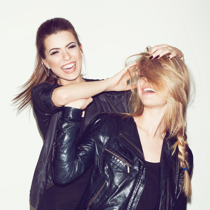 seo hairstyles two women leather jackets